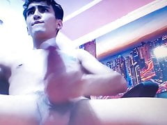 Sexy young Latino hard edges his huge thick cock