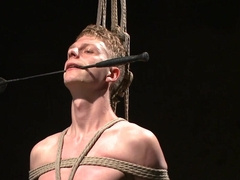 Branden Forrest  is tied up and shown in a BDSM video