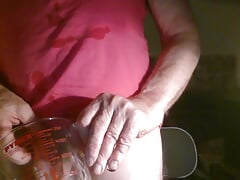 Sissy cd whore, Sarah, humiliates herself, by drinking own piss, while mouth gagged