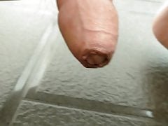Piss in the bathroom by foreskin