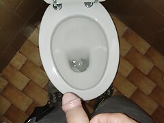 Pee in public toilet and cum on the graund