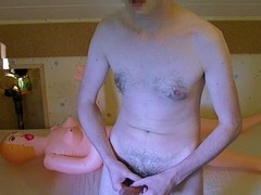 Masturbation session with sex doll using condoms