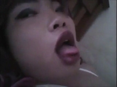 Asian Crossdresser Wanks in Bed