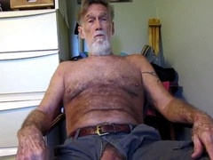 Mature daddy indulging in gay solo roleplay and intense masturbation session