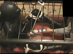 Caged rubberslave