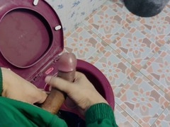 Amateur gay man jerks off in street food shop toilet