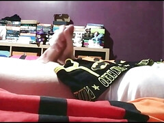 Sammy Andrews cumming on black superhero underwear