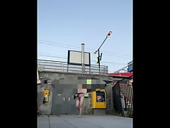 Risky naked outdoor walk train stations