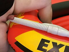 Fat Helmet Guy On Inflatable Boat Rubbing and Humping Vacuum Hose On Small Penis