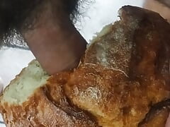 Cumming inside loaf of bread