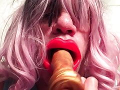 Jenni sucks dildo