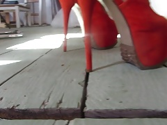 teasing with orange platform heels