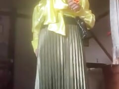 In bourgeois yellow blouse attire