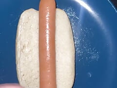 Huge watery cumshot on hotdog