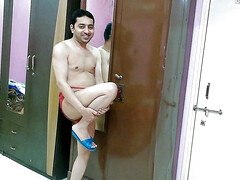 Sexy sissy crossdresser femboy Sweet Lollipop in a shirt, pantie and flip-flops.