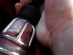 Teased in chasity with wand vibrator.