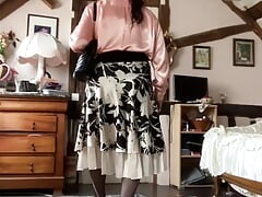 In bourgeois dress with blouse and tie, lavaliere
