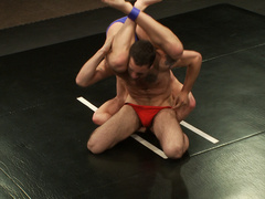 Muscular lovers strip naked to fuck during their wrestling fetish