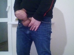 Hottie in tight blue jeans strokes his hard COCK (16cm) and shoots a massive load