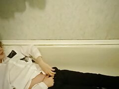 tired after a hard day a schoolboy masturbates in the bathroom with his clothes on