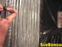 Restrained young man having his ass tormented with toys