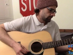 Straighty plays the guitar and faps off
