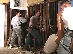 Four construction workers take a break for gay group sex