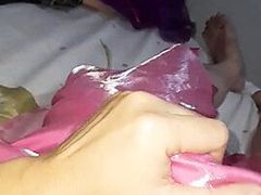 Crossdresser wearing long satin prom pink dress