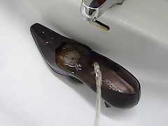 Piss in co-workers high heel