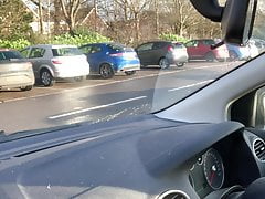Wanking on public carpark in pink stockings and panties