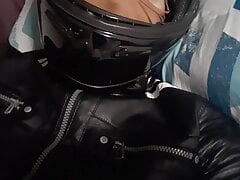 Gay edging in biker leather gear
