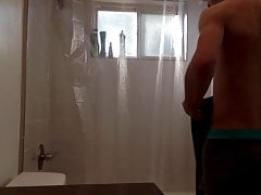 Twink takes shower while being recorded