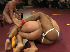 Wrestling match hotter than Satan’s jacuzzi... love it