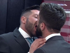 Office hunk taking care of his prey in front of the computer