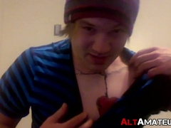 Tattooed punk jock jerking off his big throbbing cock solo