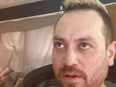 In my room, jerking off with a condom