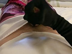 CD Handjob with black satin gloves on white satin