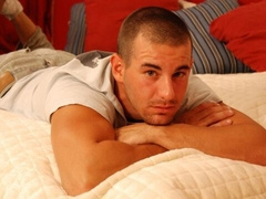 Solo hottie named Nino jacking off on a bed happily