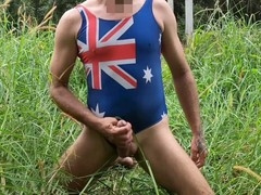 Strolling in my blue swimsuit by the beach