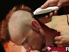 Tatted Kyle Wood jacks off his stone hard cock while using a sounding rog on it