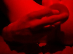 Youngster rails fake penis close up in couch