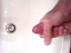 Masturbating