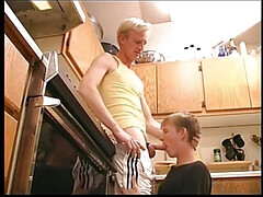 Cute blonde fucks his friends face in the kitchen