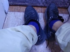 Showing off my dirty sneakers and rubbing my sweaty feet