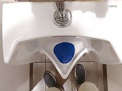 Taking a Piss at a Urinal