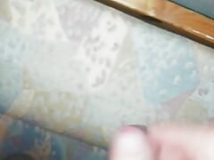 Cumming on a sofa