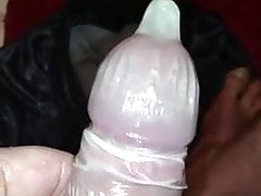 Condom filled with huge load