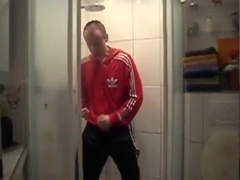 Fully dressed in adidas shower