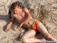 Athletic jock cums outdoor after peeing on himself