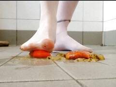 Footplay in pantyhose with fruit